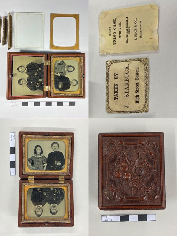 A collection of old family portrait photographs in a wooden box. 