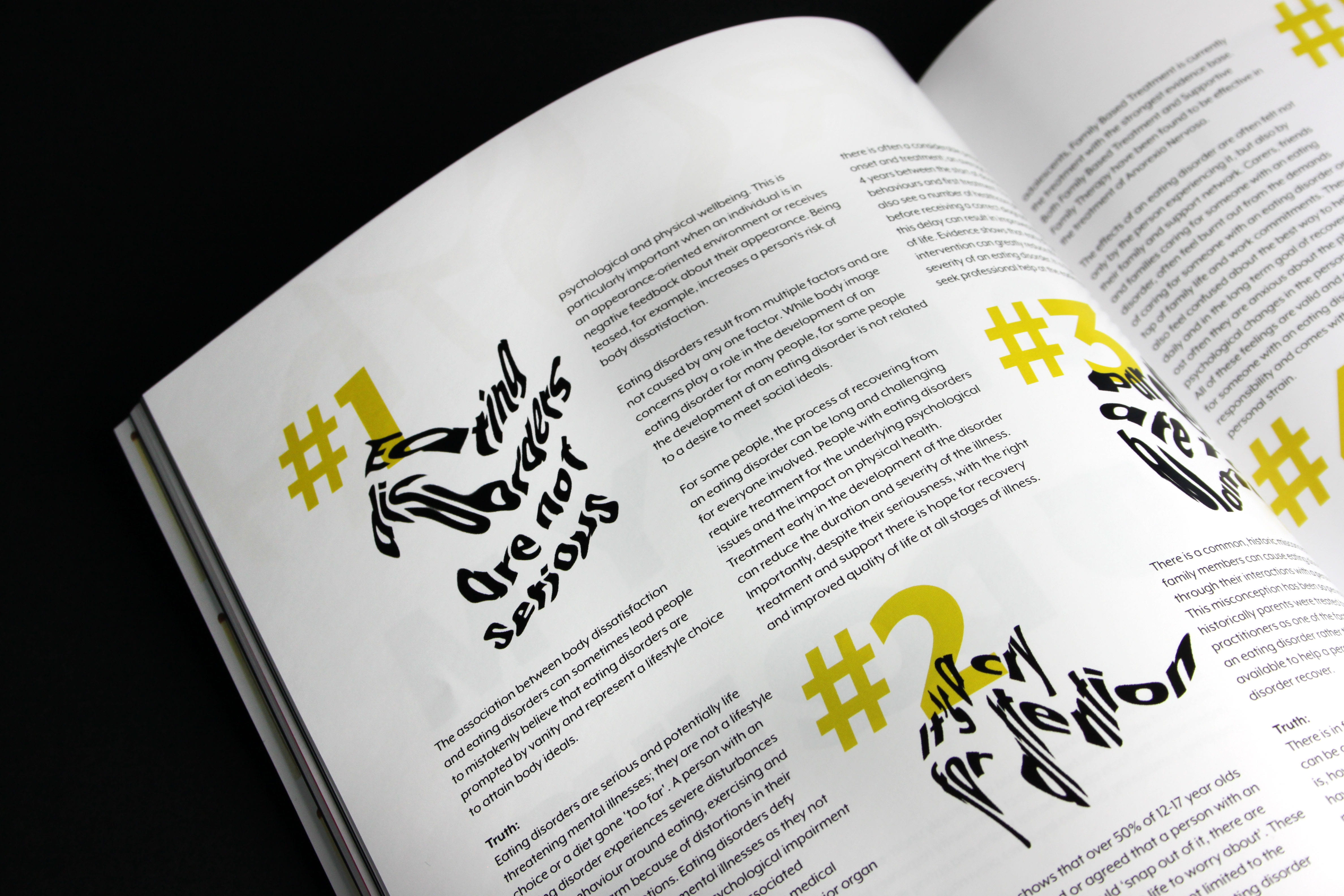 A magazine page with yellow numbers, overlapped by distorted text.