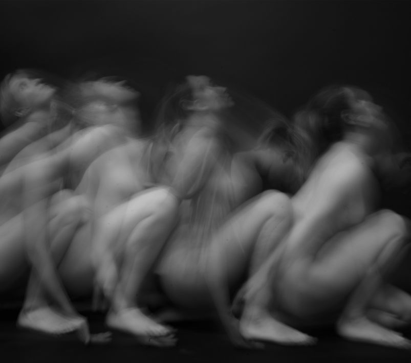 Blurred black at white photography of nude women.