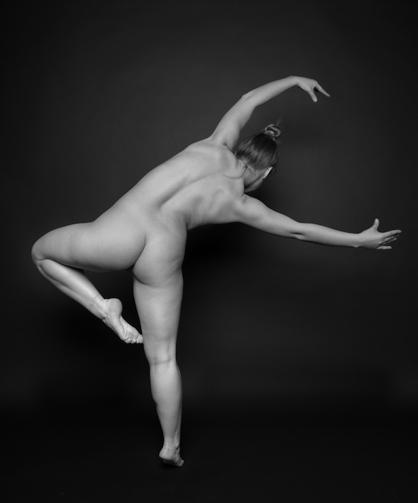 Black at white photography of nude woman in ballet pose.