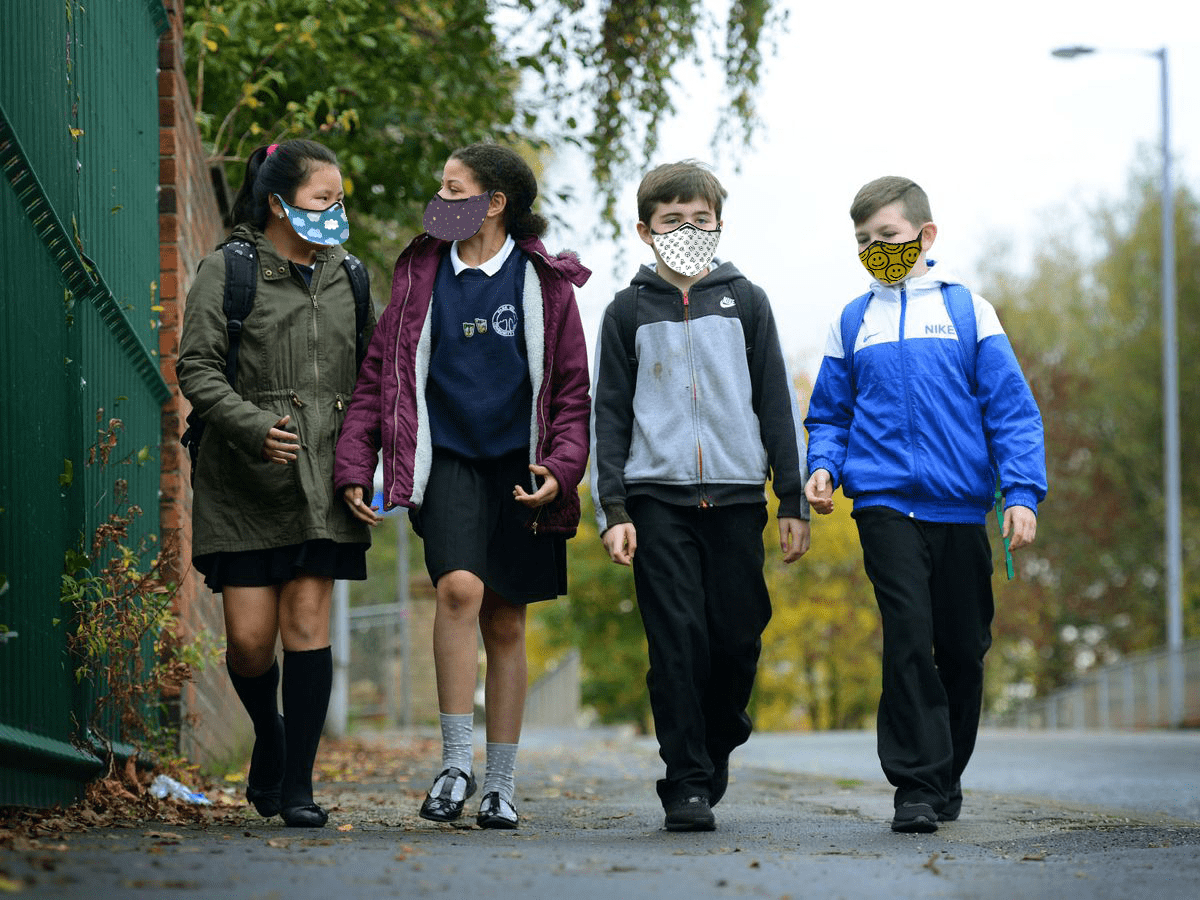 Children wearing face-masks.