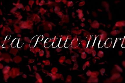 'La petite mort' on black background with red dots